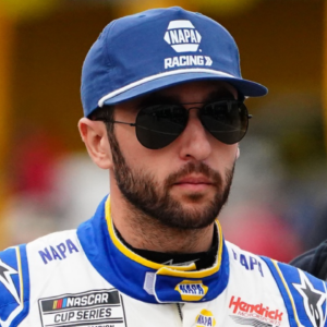 NASCAR Cup Series driver Chase Elliott (9) signs autographs during practice for the Daytona 500 at Daytona International Speedway.