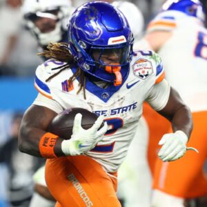Dec 31, 2024; Glendale, AZ, USA; Boise State Broncos running back Ashton Jeanty (2) rushes the ball against the Penn State Nittany Lions during the second half in the Fiesta Bowl at State Farm Stadium.