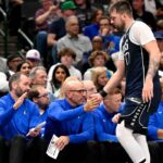 Dallas Mavericks guard Luka Doncic (77) leaves the game against the Portland Trail Blazers during the second half at the American Airlines Center.