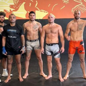 Sean Strickland (3rd from R), Alex Pereira (4th from R)