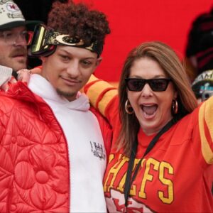 Kansas City Chiefs quarterback Patrick Mahomes (15) celebrates with his mother Randi Martin during the Kansas City Chiefs Super Bowl parade.