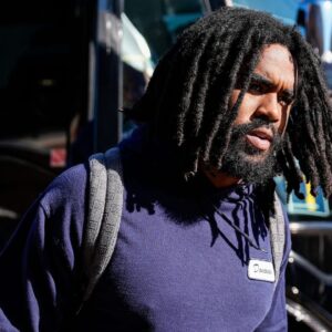 Michigan running back Donovan Edwards (7) walks off the bus as team arrive for the Oregon game at Michigan Stadium in Ann Arbor on Saturday, Nov. 2, 2024.