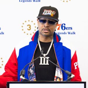 Philadelphia 76ers great Allen Iverson speaks at the podium during the unveiling of a statue honoring him in a ceremony at Penn Medicine Philadelphia 76ers Training Complex.