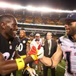 Pittsburgh Steelers wide receiver Antonio Brown (84) and New England Patriots wide receiver Julian Edelman (11) shake hands after their game at Heinz Field. New England won 27-16.