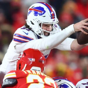 Jan 26, 2025; Kansas City, MO, USA; Buffalo Bills quarterback Josh Allen (17) dives for a first down against the Kansas City Chiefs during the second half in the AFC Championship game at GEHA Field at Arrowhead Stadium.