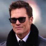 Announcer Tom Brady looks on before an NFC wild card game between the Philadelphia Eagles and the Green Bay Packers at Lincoln Financial Field.