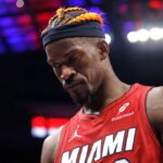 Miami Heat forward Jimmy Butler (22) walks off the court after the game against the Detroit Pistons at Little Caesars Arena
