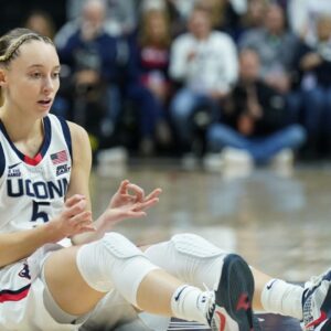 UConn Huskies guard Paige Bueckers (5) reacts after her three point basket and being fouled by the Villanova Wildcats in the first half at Harry A. Gampel Pavilion