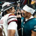 Nov 14, 2024; Philadelphia, Pennsylvania, USA; Philadelphia Eagles quarterback Jalen Hurts (1) and Washington Commanders quarterback Jayden Daniels (5) shake hands after an Eagles victory at Lincoln Financial Field.