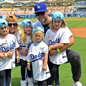 USA; Los Angeles Rams quarterback Matthew Stafford (9) with his wife Kelly with their 4 daughters on the field prior to the game between the Los Angeles Dodgers and the Atlanta Braves at Dodger Stadium. Stafford was at the game on Rams day.