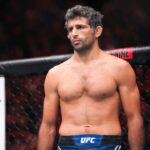 Beneil Dariush (red gloves) fights Arman Tsarukyan (blue gloves) during UFC Fight Night at Moody Center.