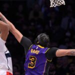 Los Angeles Lakers forward Anthony Davis (3) blocks a shot by Washington Wizards guard Bilal Coulibaly (0) at Crypto.com Arena.