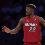 Miami Heat forward Jimmy Butler (22) reacts against the Portland Trail Blazers during the third quarter at Kaseya Center