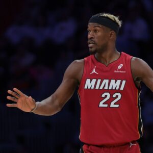 Miami Heat forward Jimmy Butler (22) reacts against the Portland Trail Blazers during the third quarter at Kaseya Center