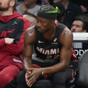 Miami Heat forward Jimmy Butler (22) looks on from the bench during the second half at Kaseya Center.