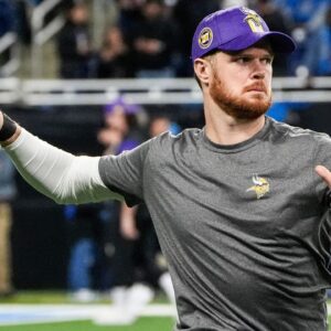 Minnesota Vikings quarterback Sam Darnold (14) warms up before the game between Detroit Lions and Minnesota Vikings at Ford Field in Detroit.