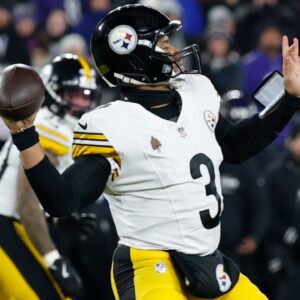 Jan 11, 2025; Baltimore, Maryland, USA; Pittsburgh Steelers quarterback Russell Wilson (3) passes against the Baltimore Ravens in the second quarter in an AFC wild card game at M&T Bank Stadium.