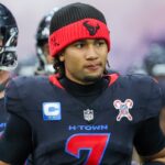 Houston Texans quarterback C.J. Stroud (7) enters the field before playing against the Baltimore Ravens at NRG Stadium.