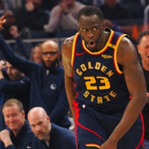 Golden State Warriors forward Draymond Green (23) reacts after a basket against the Sacramento Kings during the second quarter at Chase Center.