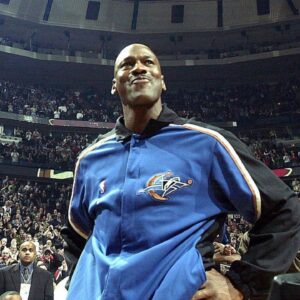 Michael Jordan gets emotional during an ovation after player introductions in his return to the United Center in Chicago with the Wizards in 2002.
