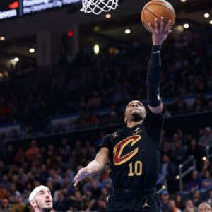 Cleveland Cavaliers guard Darius Garland (10) goes up for a basket against the Oklahoma City Thunder during the second quarter at Paycom Center.