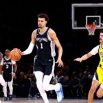 San Antonio Spurs player Victor Wembanyama in action with Indiana Pacers player Ben Sheppard in the Paris Games 2025 NBA basketball game at Accor Arena