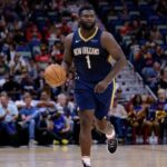ew Orleans Pelicans forward Zion Williamson (1) dribbles against the Cleveland Cavaliers during the first half at Smoothie King Center.
