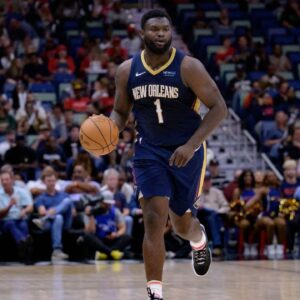 ew Orleans Pelicans forward Zion Williamson (1) dribbles against the Cleveland Cavaliers during the first half at Smoothie King Center.