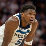Minnesota Timberwolves guard Anthony Edwards (5) looks on in the second half against the Memphis Grizzlies at Target Center.