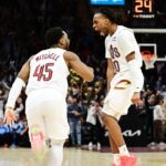 Cleveland Cavaliers guard Donovan Mitchell (45) and guard Darius Garland (10) celebrate after Mitchell made a three point basket during the second half against the Oklahoma City Thunder at Rocket Mortgage FieldHouse.