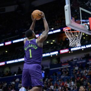 New Orleans Pelicans forward Zion Williamson (1) dunks against the Minnesota Timberwolves during the first half at Smoothie King Center.