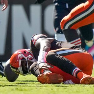 Cleveland Browns quarterback Deshaun Watson (4) goes down with a non-contact injury to his lower leg in the second quarter of the NFL Week 7 game between the Cleveland Browns and the Cincinnati Bengals at Huntington Bank Field in downtown Cleveland.