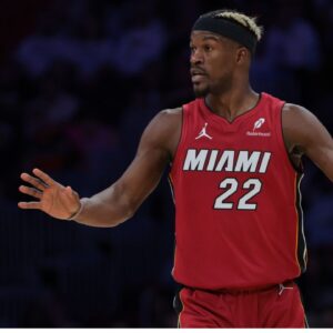 Miami Heat forward Jimmy Butler (22) reacts against the Portland Trail Blazers during the third quarter at Kaseya Center
