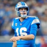 Detroit Lions quarterback Jared Goff (16) looks on after being sacked in the first quarter against the Washington Commanders in the NFC divisional round at Ford Field in Detroit on Saturday, Jan. 18, 2025.