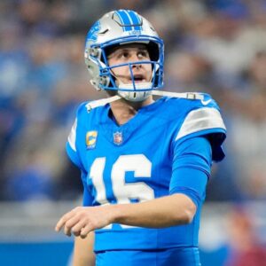 Detroit Lions quarterback Jared Goff (16) looks on after being sacked in the first quarter against the Washington Commanders in the NFC divisional round at Ford Field in Detroit on Saturday, Jan. 18, 2025.