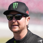 Apr 23, 2022; Talladega, Alabama, USA; NASCAR Cup Series driver Kurt Busch (45) walks down pit road during qualifying for the GEICO 500 at Talladega Superspeedway. Mandatory Credit: Jasen Vinlove-Imagn Images
