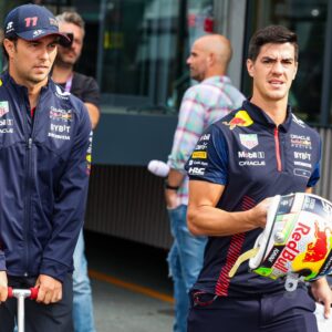 PEREZ Sergio (mex), Red Bull Racing RB19, with his performance coach, Jo Canales, in the paddock during the 2023 Formula 1 Heineken Dutch Grand Prix, 13th round of the 2023 Formula One World Championship