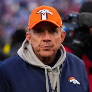 Denver Broncos head coach Sean Payton walks off the field after losing to the Buffalo Bills in an AFC wild card game at Highmark Stadium.