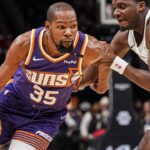 Phoenix Suns forward Kevin Durant (35) is defended by Atlanta Hawks center Clint Capela (15) during the second half at State Farm Arena.