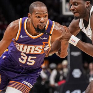 Phoenix Suns forward Kevin Durant (35) is defended by Atlanta Hawks center Clint Capela (15) during the second half at State Farm Arena.