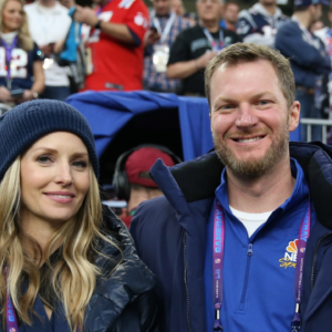 Former NASCAR driver Dale Earnhardt Jr. and wife Amy in attendance before Super Bowl LII between the Philadelphia Eagles and the New England Patriots at U.S. Bank Stadium.
