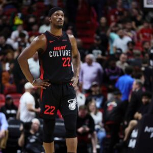 Miami Heat forward Jimmy Butler (22) looks on from the court against the Memphis Grizzlies during the fourth quarter at Kaseya Center.