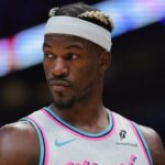 Miami Heat forward Jimmy Butler (22) looks on against the Denver Nuggets during the third quarter at Kaseya Center
