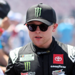 NASCAR Cup Series driver Ty Gibbs (54) greets fans before the Goodyear 400 at Darlington Raceway.