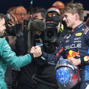After winning his fourth F1 world title, Max Verstappen (1) Oracle Red Bull Racing shakes hands with Fernando Alonso in the pits at the conclusion of the F1 Heineken Silver Las Vegas Grand Prix