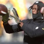 Pittsburgh Steelers wide receiver George Pickens (14) warms up before the game against the Green Bay Packers at Acrisure Stadium.