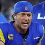 Jan 13, 2025; Glendale, AZ, USA; Los Angeles Rams quarterback Matthew Stafford (9) reacts on the bench against the Minnesota Vikings during the first half in an NFC wild card game at State Farm Stadium.