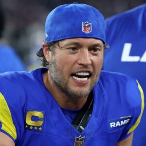 Jan 13, 2025; Glendale, AZ, USA; Los Angeles Rams quarterback Matthew Stafford (9) reacts on the bench against the Minnesota Vikings during the first half in an NFC wild card game at State Farm Stadium.