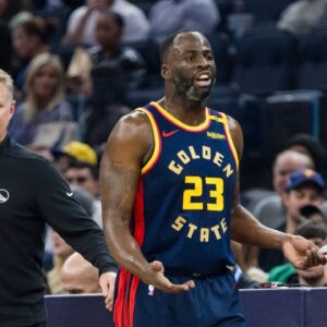 Golden State Warriors forward Draymond Green (23) and head coach Steve Kerr react during the first quarter against the Miami Heat at Chase Center.