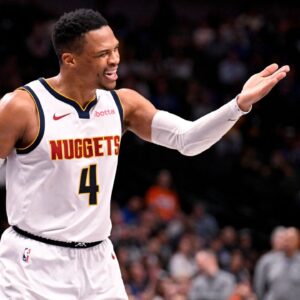 Denver Nuggets guard Russell Westbrook (4) motions to the Dallas Mavericks fans after he scores on a layup during the second half at the American Airlines Center.
